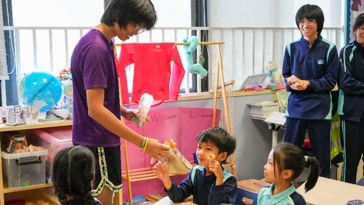 Grade 8 Students Share Cultural Heritage with Grade 1 - Bringing Folk Traditions